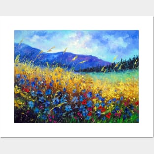Blooming field near the mountains Posters and Art
